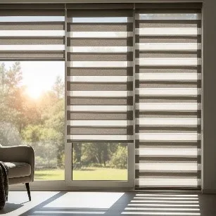 A sunlit living room with light-filtering zebra blinds on a large window. The blinds have alternating sheer and solid stripes in a neutral beige colour, allowing soft, diffused light to enter the room.